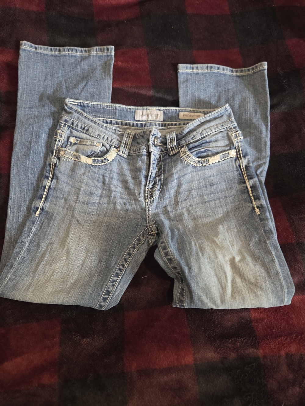 Daytrip Light Blue Bootcut Jeans with Subtle Distressing
